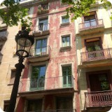 Fresco detailing and balconies along La Rambla...