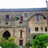 The artist's rooms overlooked either the Mediterranean Sea and surrounding countryside...or chapel ruins and inner courtyard.