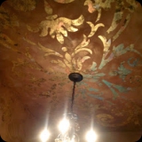 75  Exquisite powder room - Inlaid gold Lusterstone finish on walls & custom ornamental ceiling.