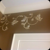 159  Chipped plaster ornamental detailing for a powder room.